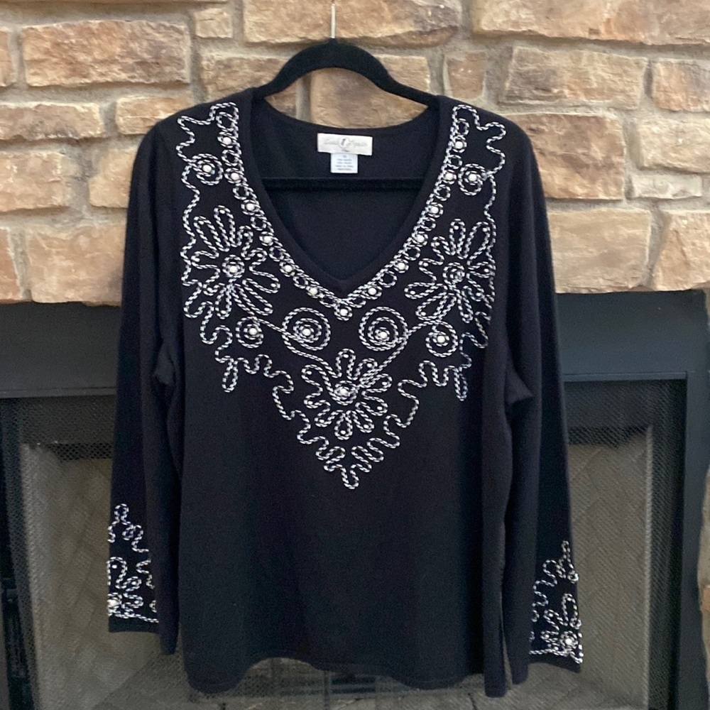 Once Again black sweater with black and white stitching and Pearl design. 1X
